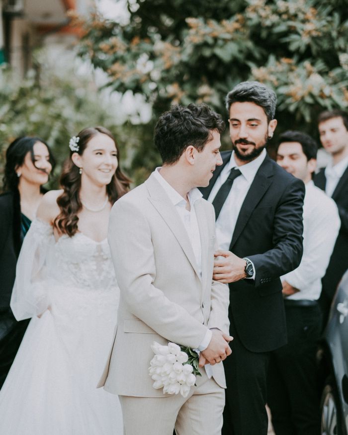 Crafting Captivating Headlines: Your awesome post title goes here Happy couple and guests celebrating an outdoor wedding in Antalya, Türkiye.